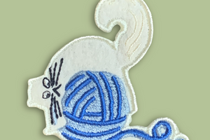 Chat et pelote
